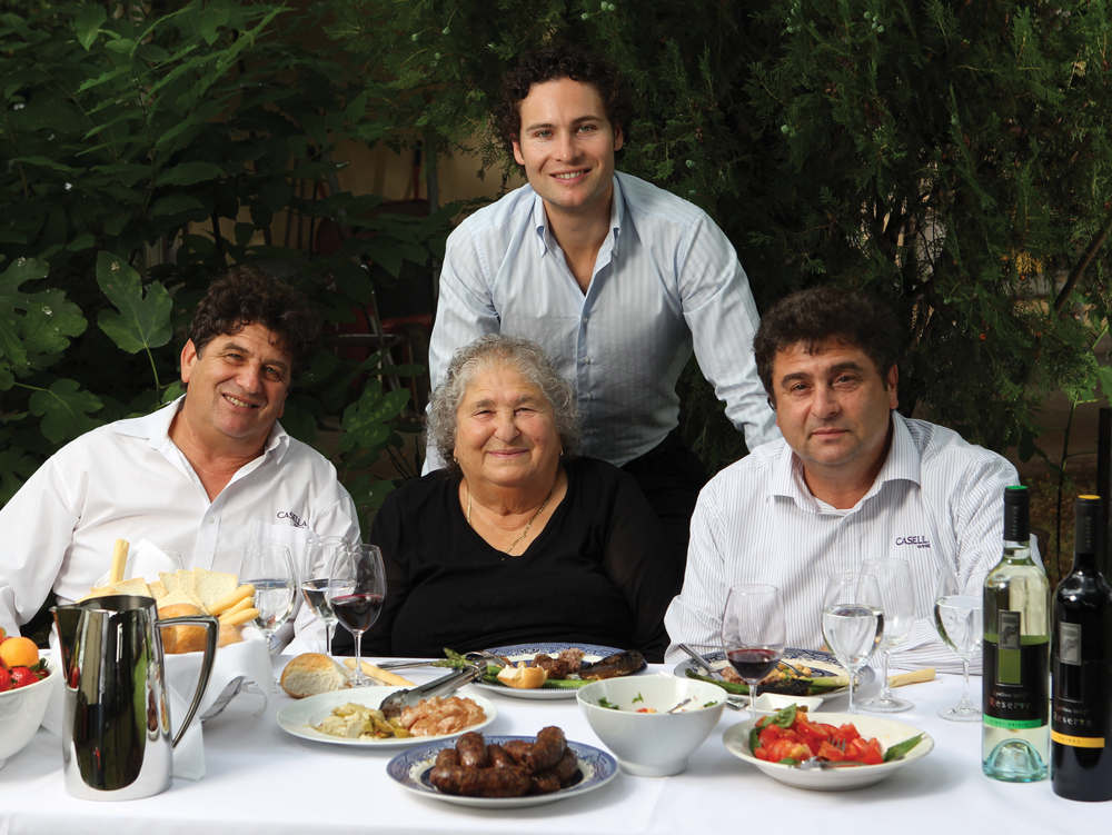 Three generations of the Casella family have helped build Casella Wines from a small regional winery to Australia's top wine exporter to the US (from left) Joe, co-founder Maria (who sadly passed away in August last year), Daniel (centre), and John