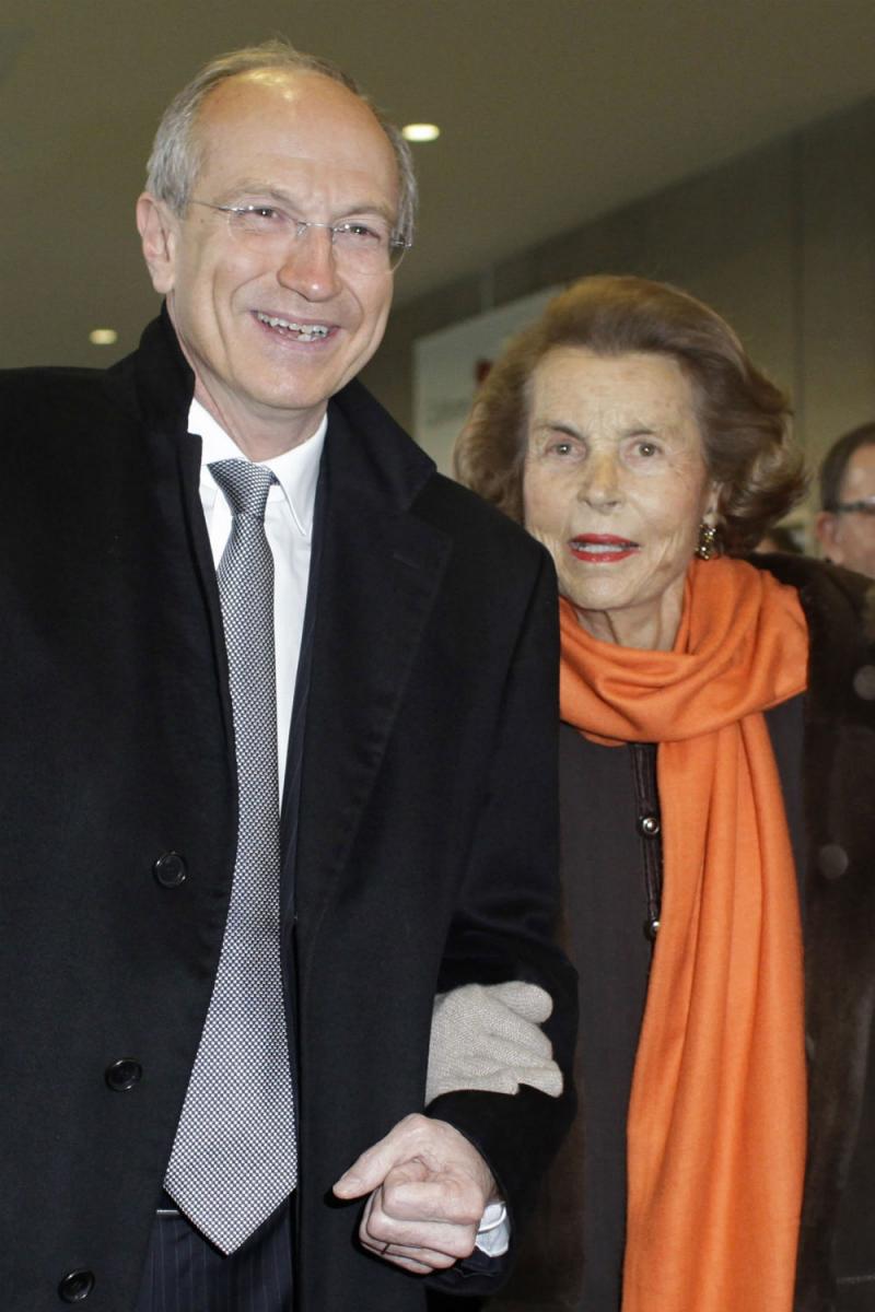 L'Oreal heiress Liliane Bettencourt, right, and L'Oreal chief executive Jean-Paul Agon