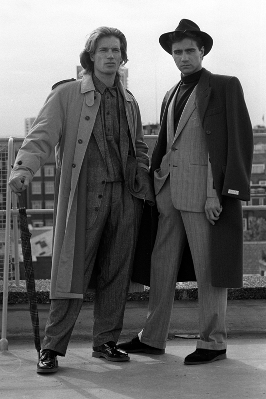 Modelling the latest designer look from Selfridges Menswear Department, London, 1987 - Clive (R) wears an Ermenegildo Zegna check suit - Ph. Press Association