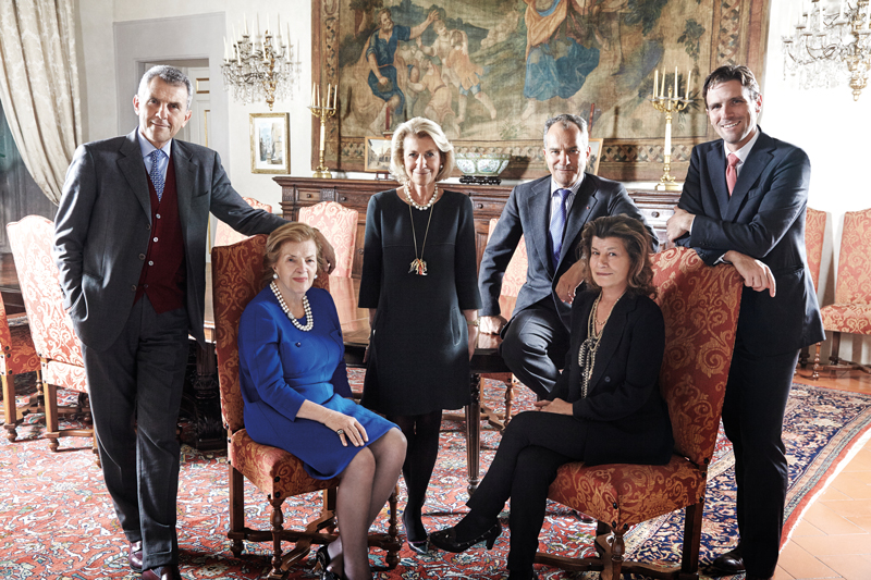 The Ferragamo Dynasty (from left to right): Ferruccio, eldest son and president; Wanda, matriarch and honorary chairwoman; daughter Giovanna, deputy chairwoman who created the women's wear division; Leonardo, CEO of the group's holding company; daughter Fulvia, vice president of the holding company; and grandson James, director of women's and men's shoes and leather goods