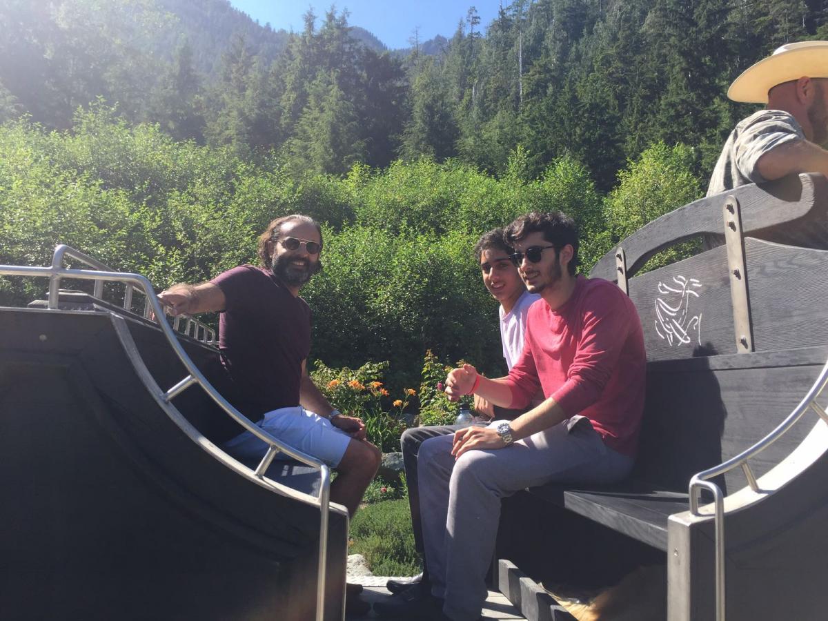 Feisal Alibhai (second from left) at Clayoquot Wilderness Resort, Canada with his younger son Kazim (far left), his beloved Suz (second from right) and older son Mahdi (right)