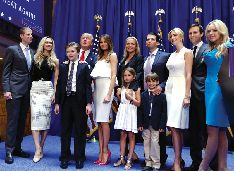 The Trump family. From left: Donald Trump’s son Eric Trump, with his wife Lara Yunaska; Donald Trump’s son Barron Trump, wife Melania Trump; Vanessa Haydon and her husband Donald Trump Junior; daughter Ivanka Trump with her husband Jared Kushner; daughter Tiffany Trump. In the front row are Kai Trump and Donald Trump III, children of Donald Trump Junior