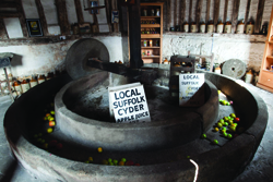 An old-fashioned cider press – Aspall has only recently switched to modern manufacturing equipment